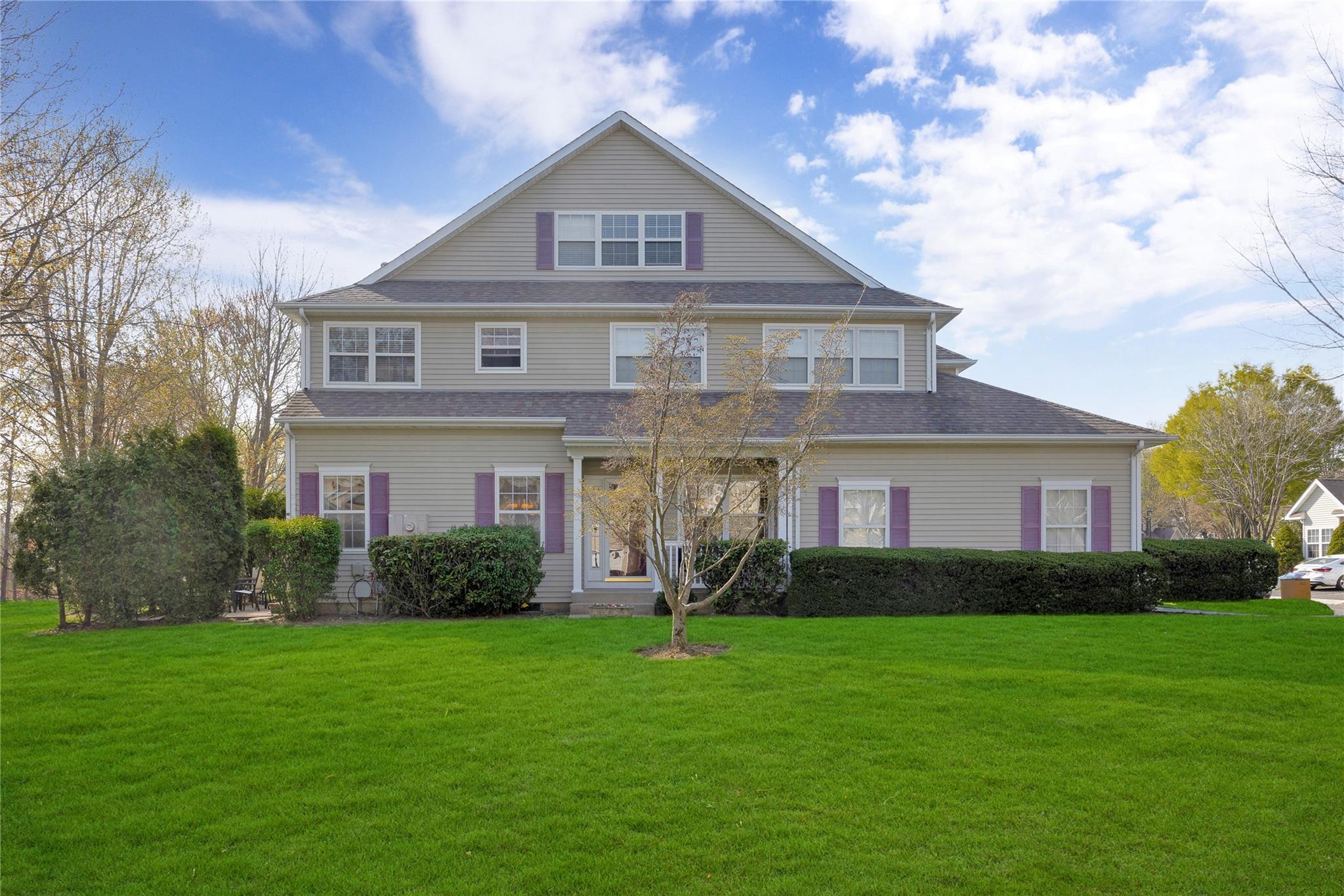 View of front of house. Grass enhanced