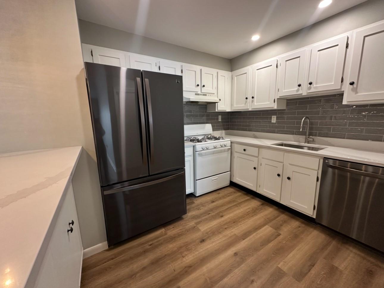 Quartz Cabinets and Stainless Steel appliances