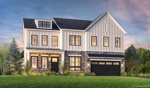 Modern farmhouse featuring a front lawn, stone siding, and board and batten siding