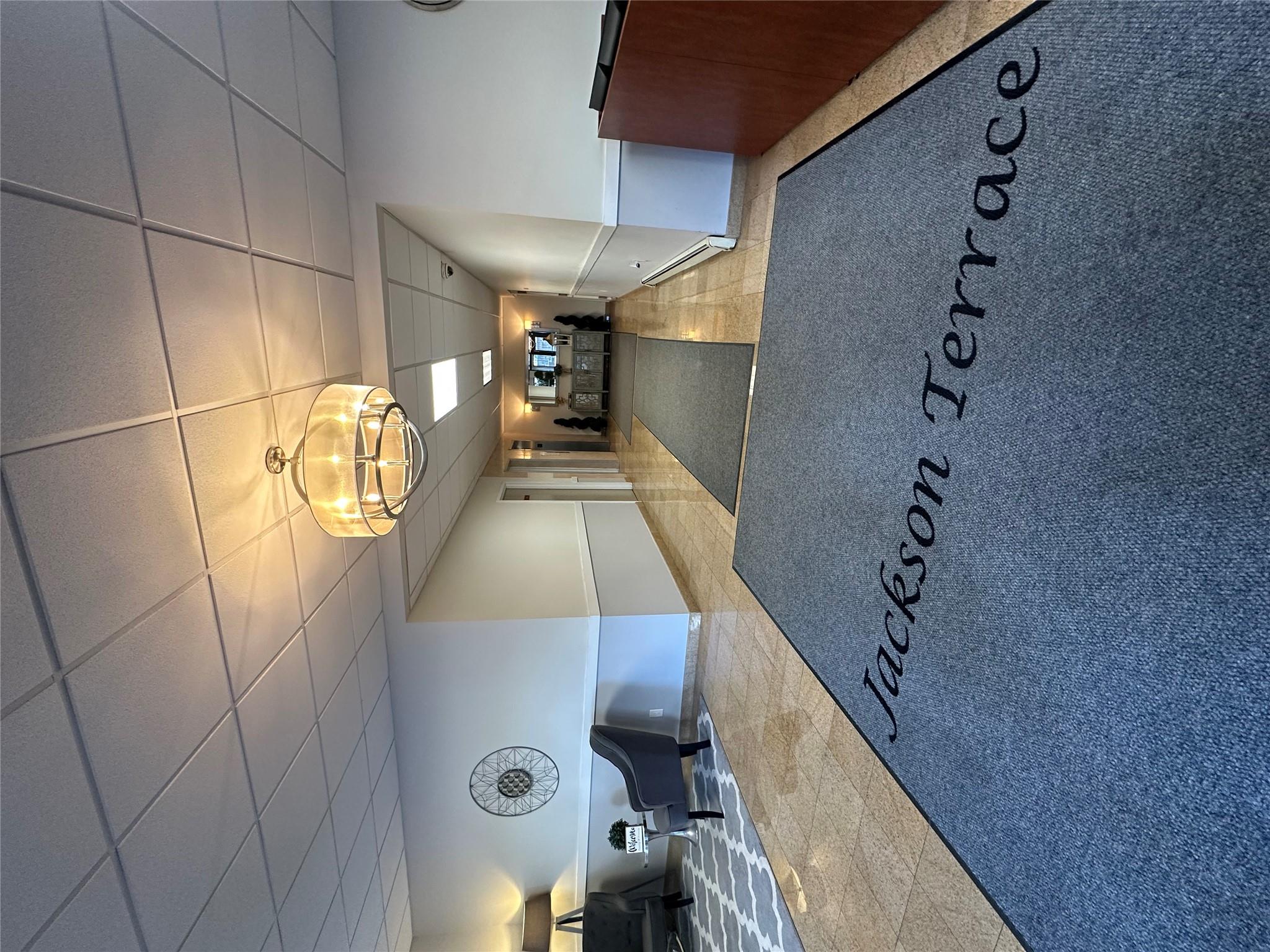 Lobby featuring a drop ceiling