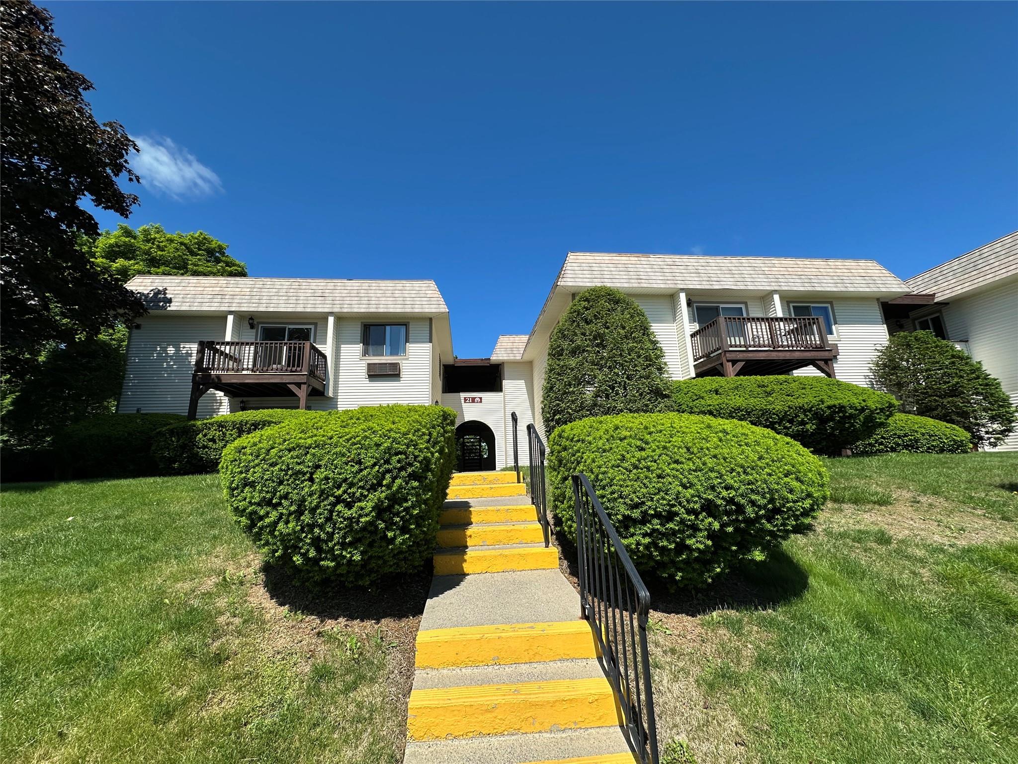 View of front of property with a walkway