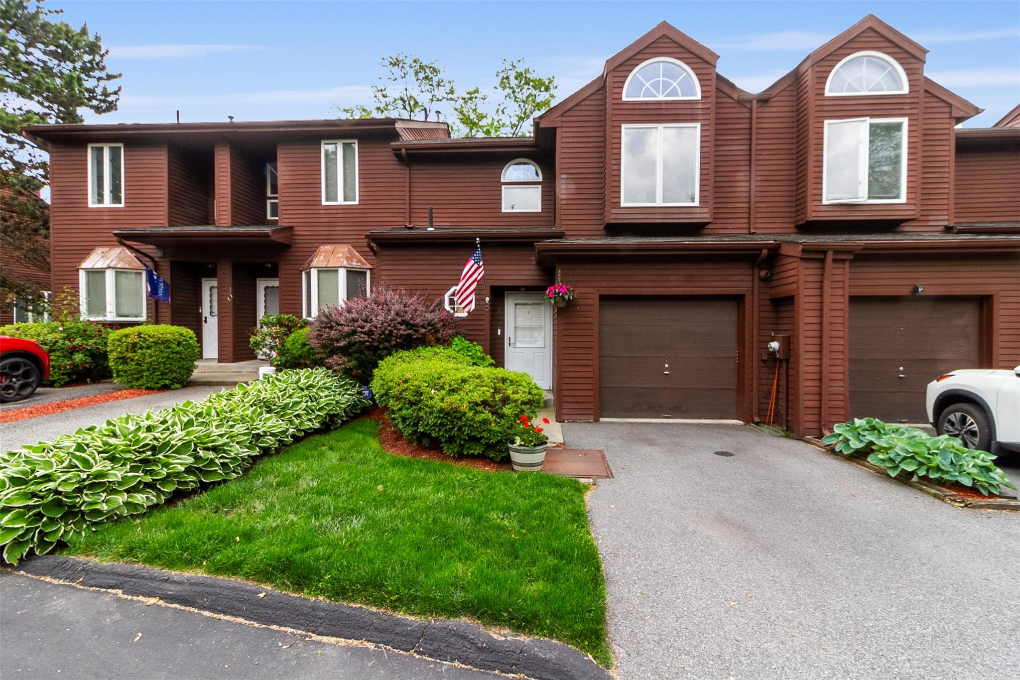 Welcome to 8 Knoll View! Enter through your own 1 car garage. Additional parking in driveway as well as guest parking lots.
