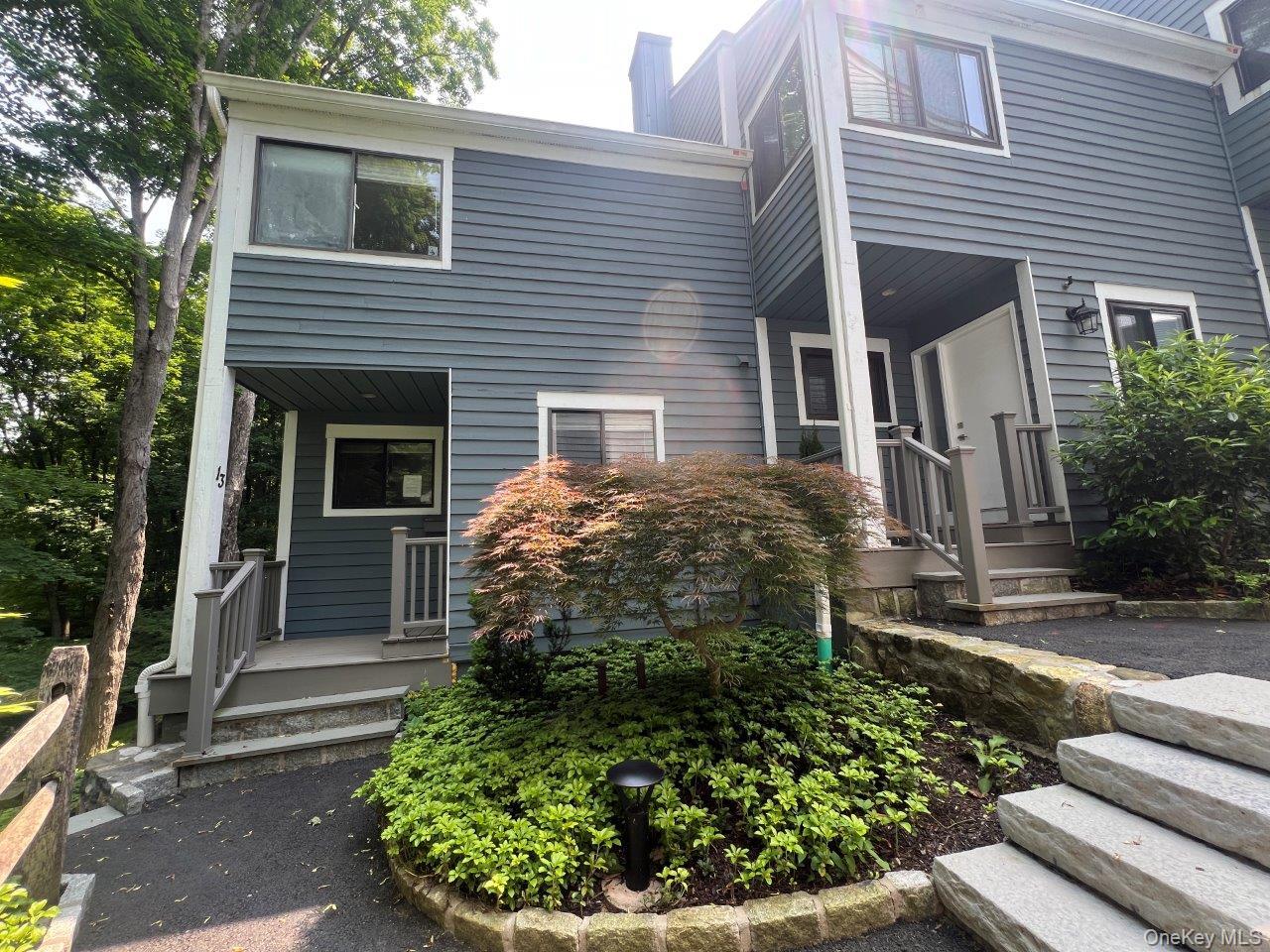 View of front of property with a chimney