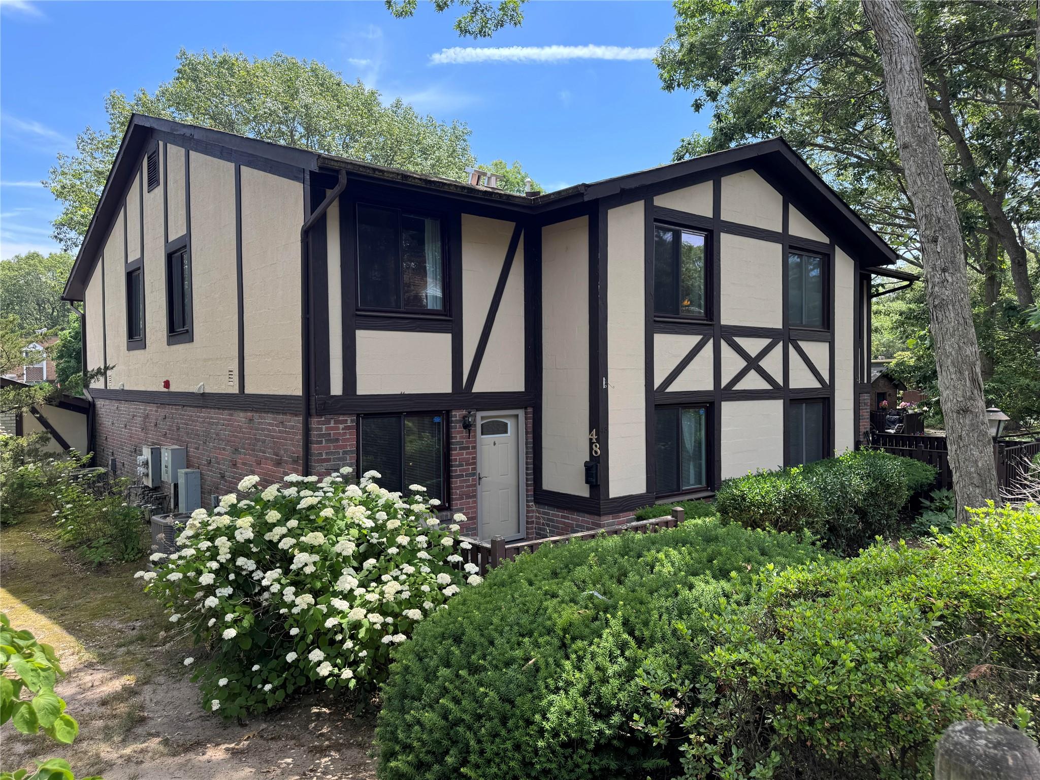 View of front of property with brick siding