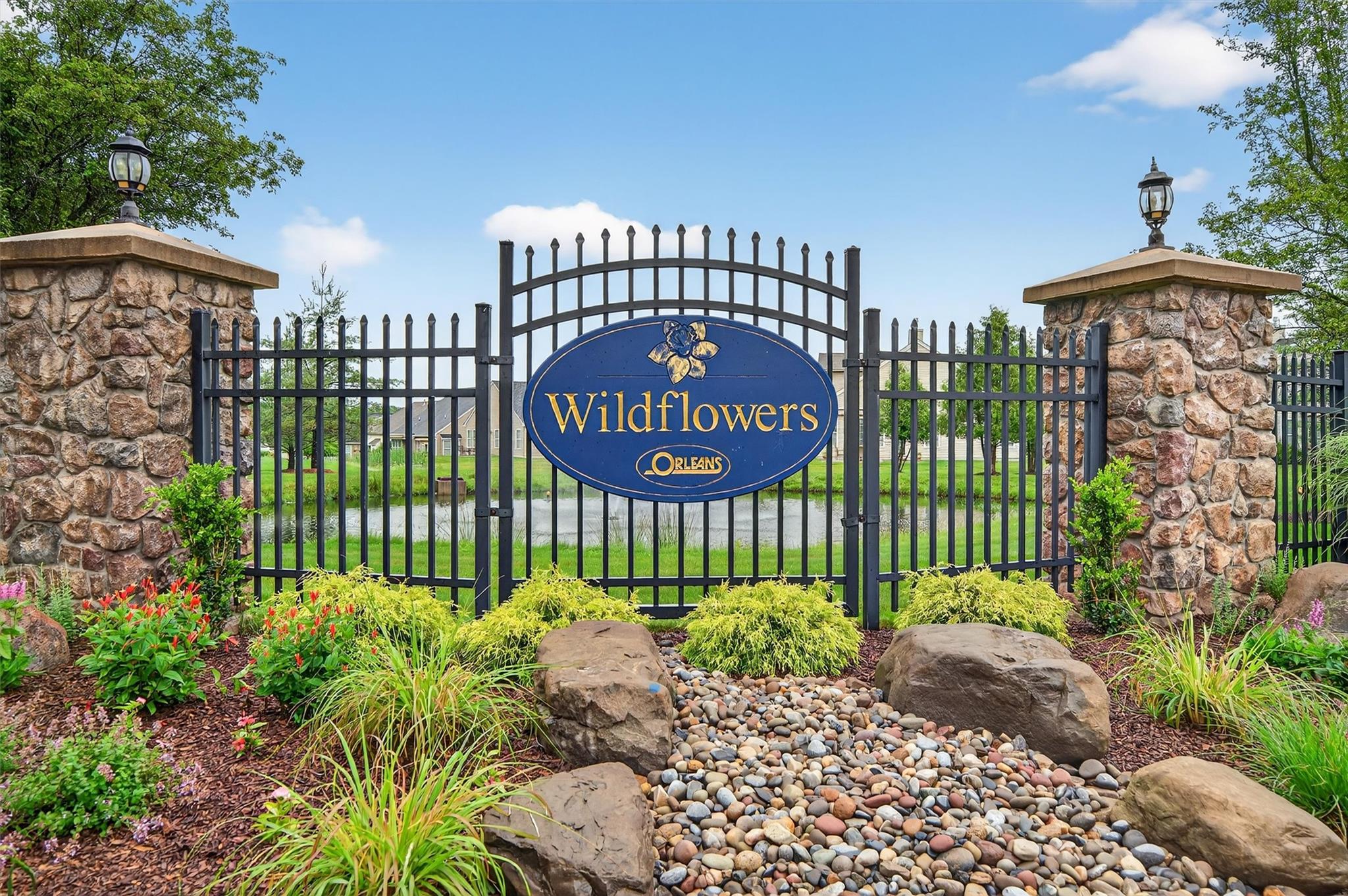 Community sign with a gate