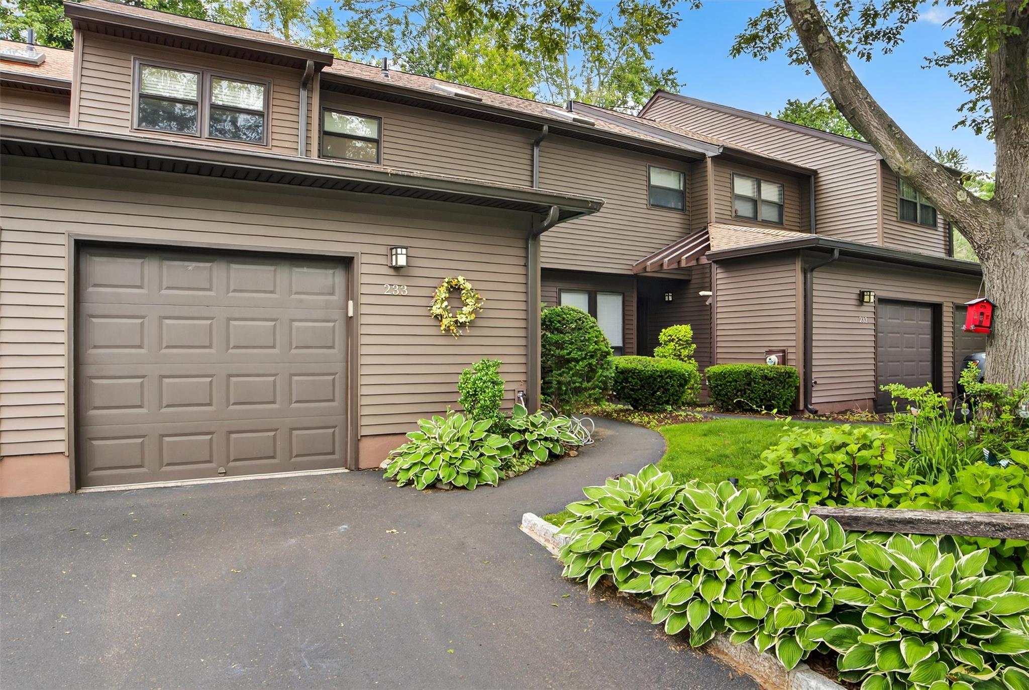 Townhome / multi-family property with driveway