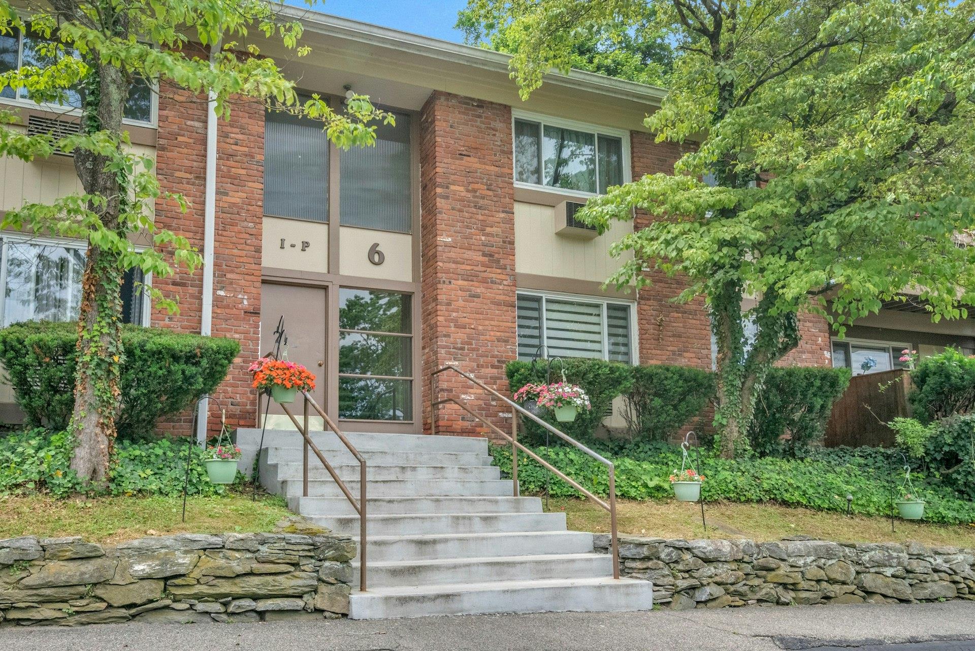 View of front of property with brick siding
