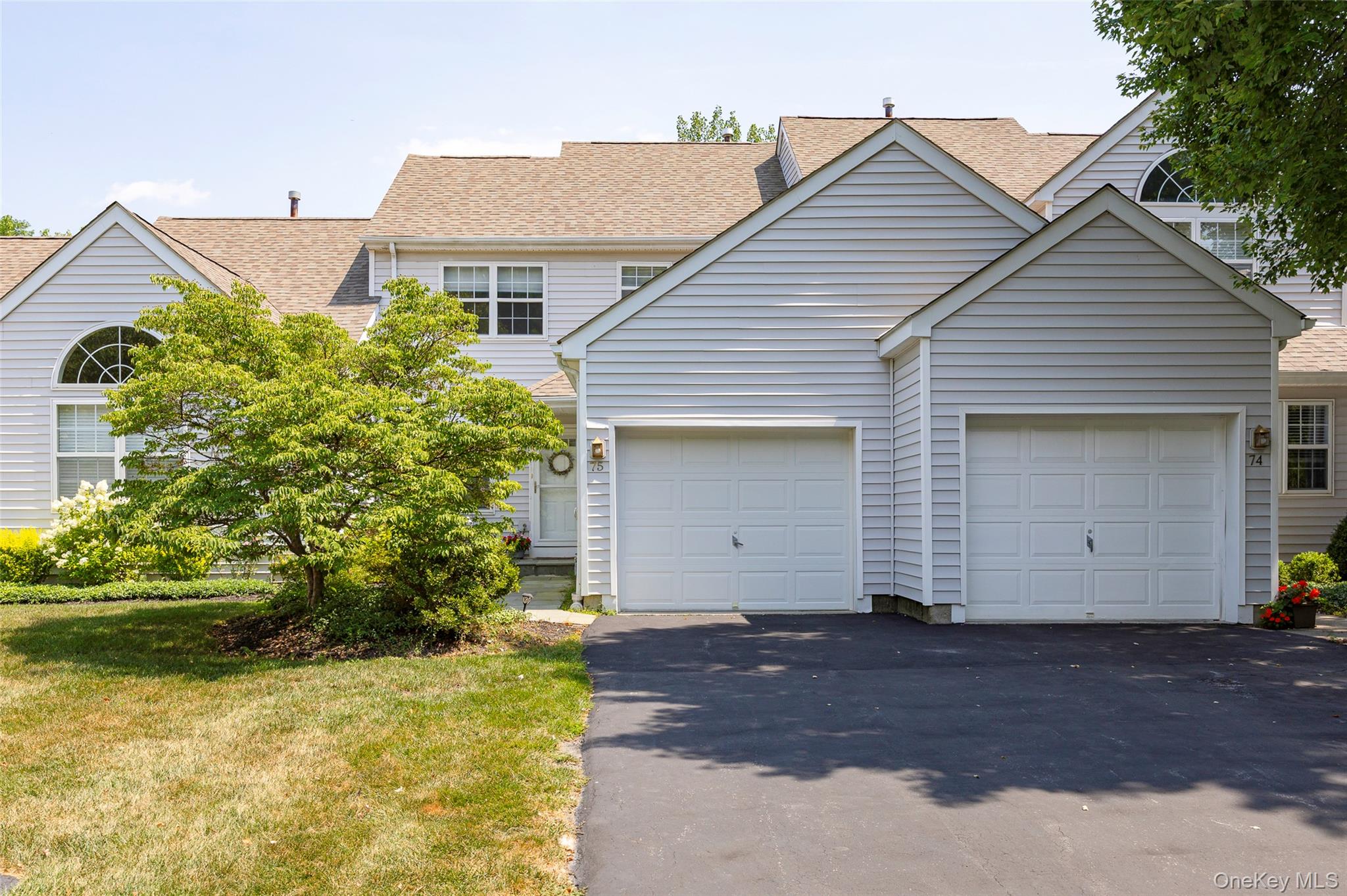 Welcome to 75 Muirfield Court! Light-Filled 2 BR, 2.2 Baths Townhome w/Screened Porch & Walkout Basement