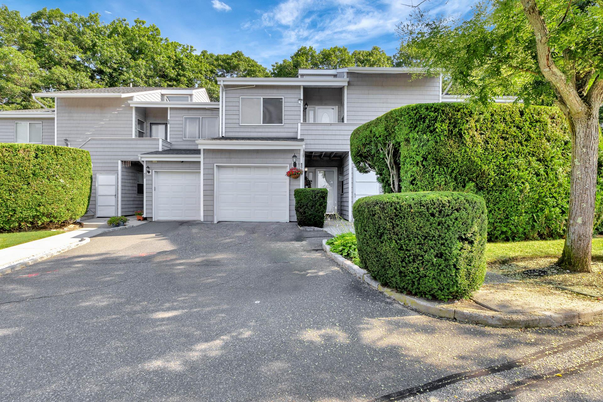 View of front of house featuring driveway and a garage