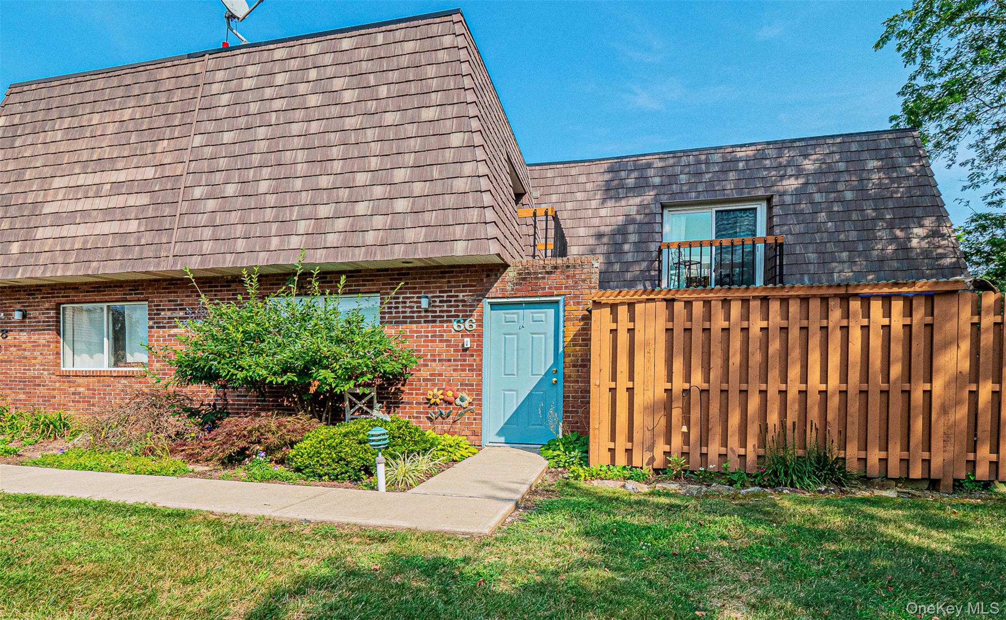 Welcome to 66 Laudaten Way with your own private courtyard