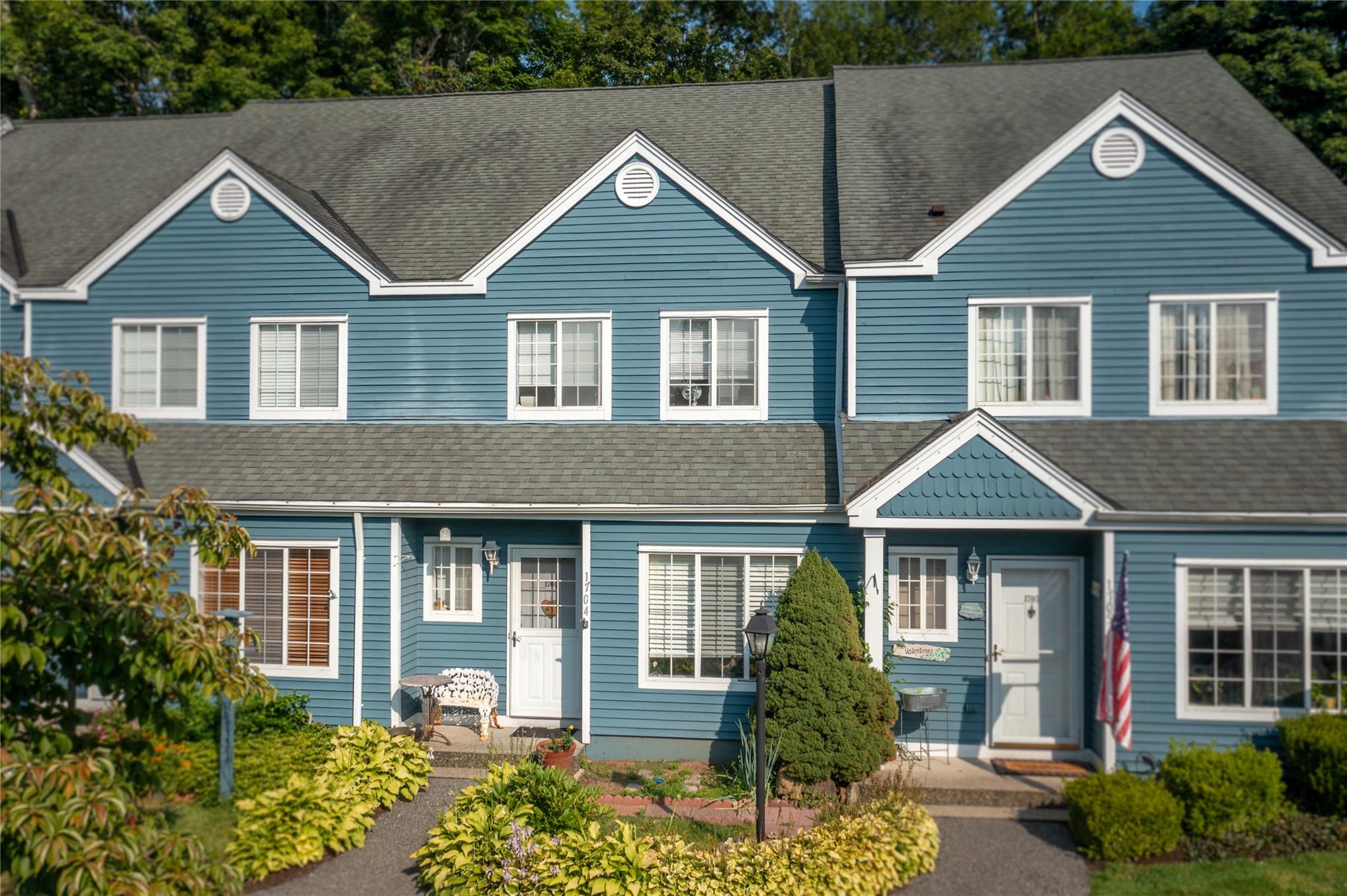 View of front of property featuring roof with shingles