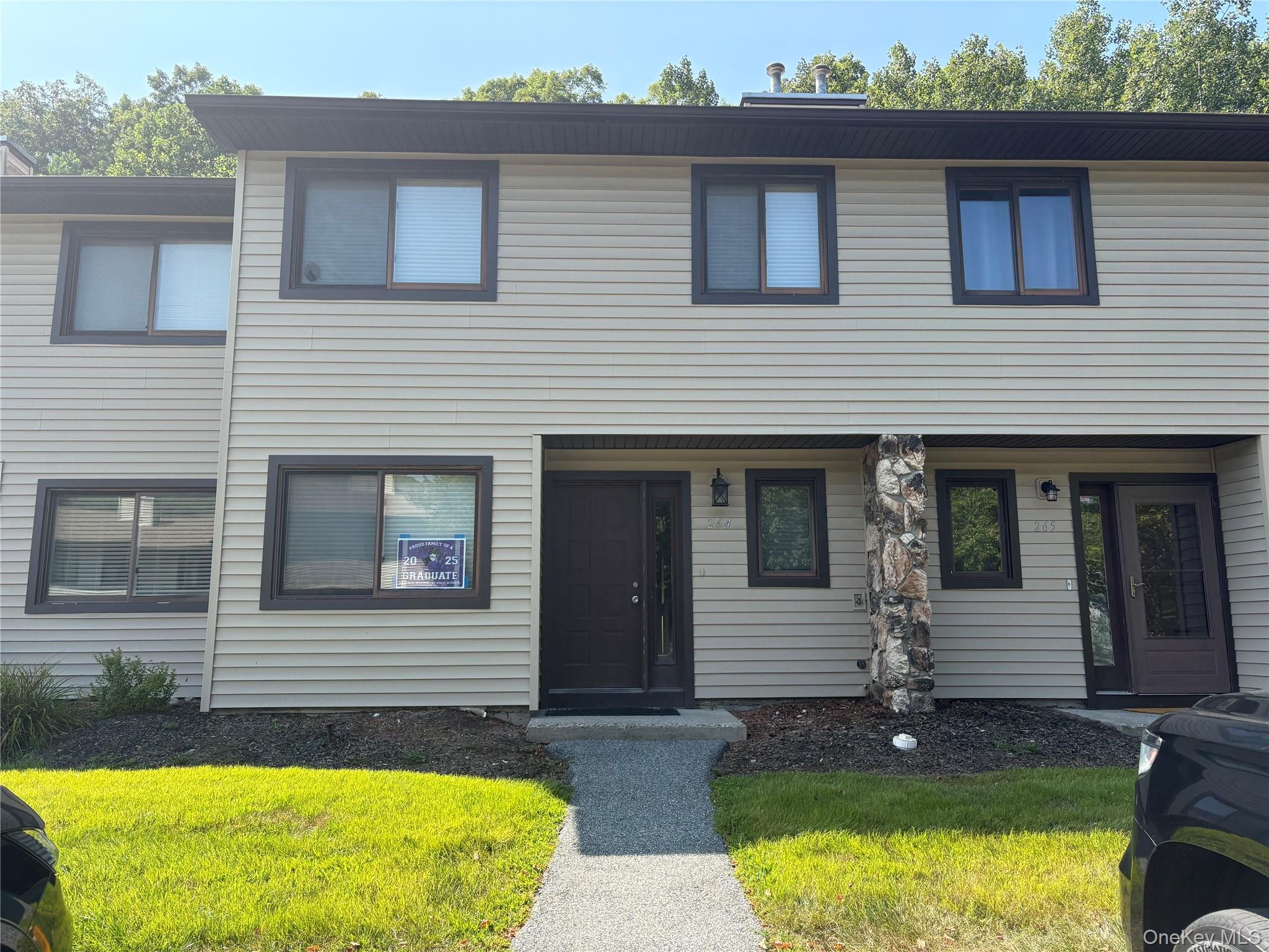 View of front facade with a front lawn
