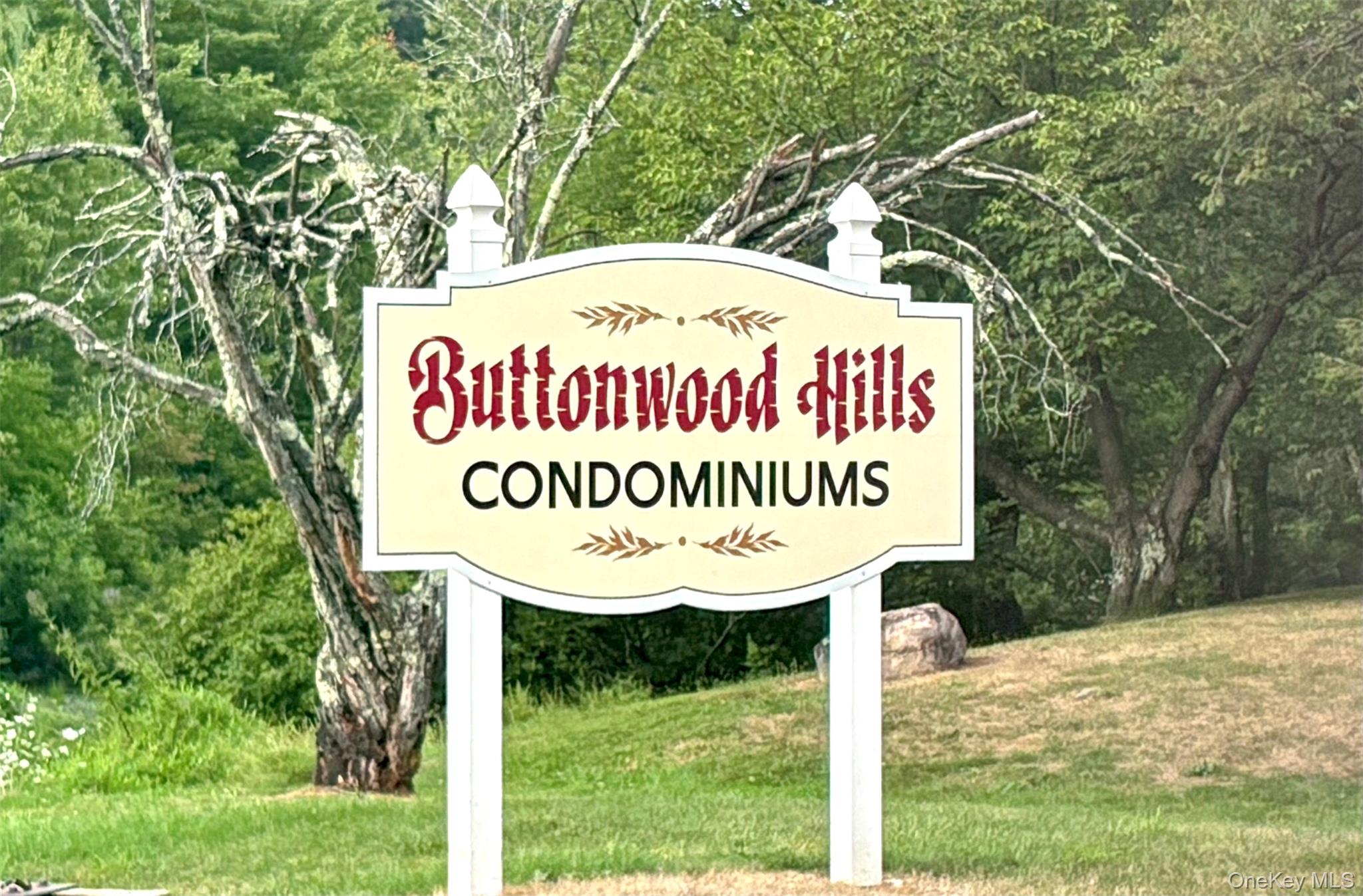 Community sign with a lawn