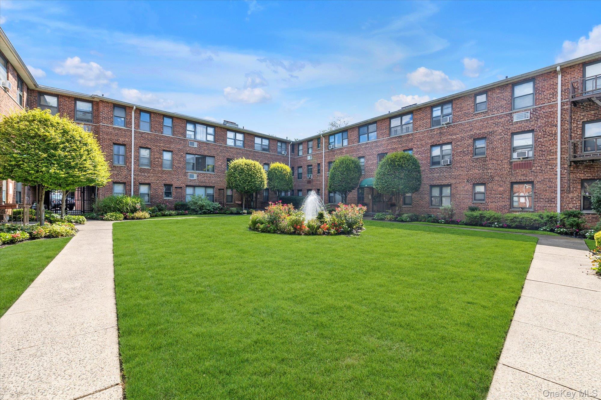 View of home's community featuring a yard