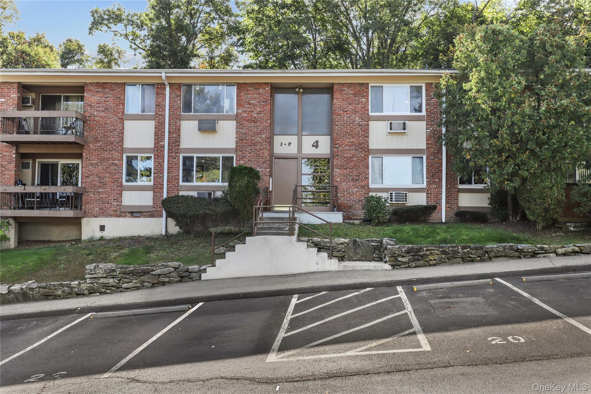 Front of building 4, there is an assigned parking space 22 plus additional visitor parking.