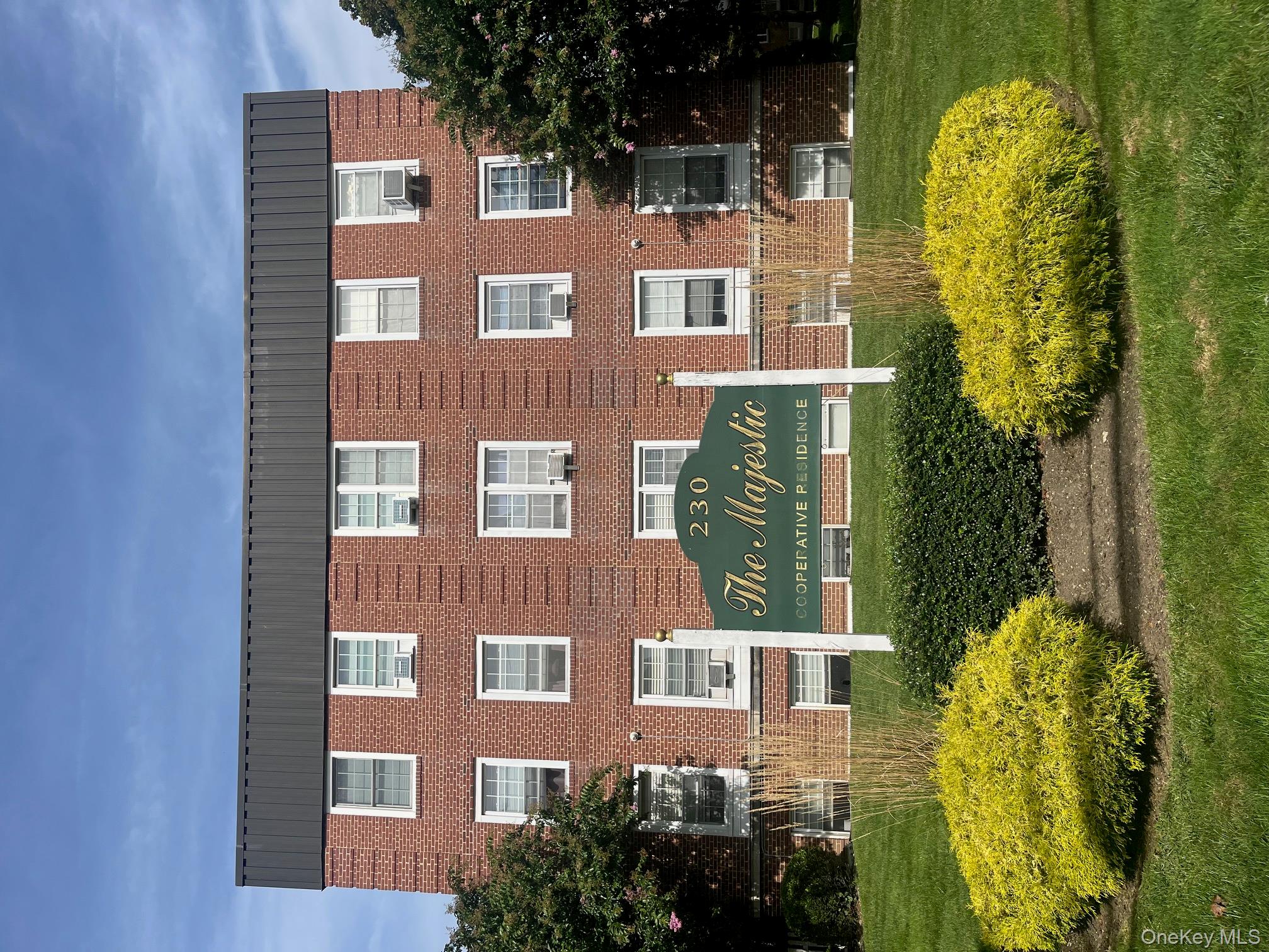 Community sign with a yard