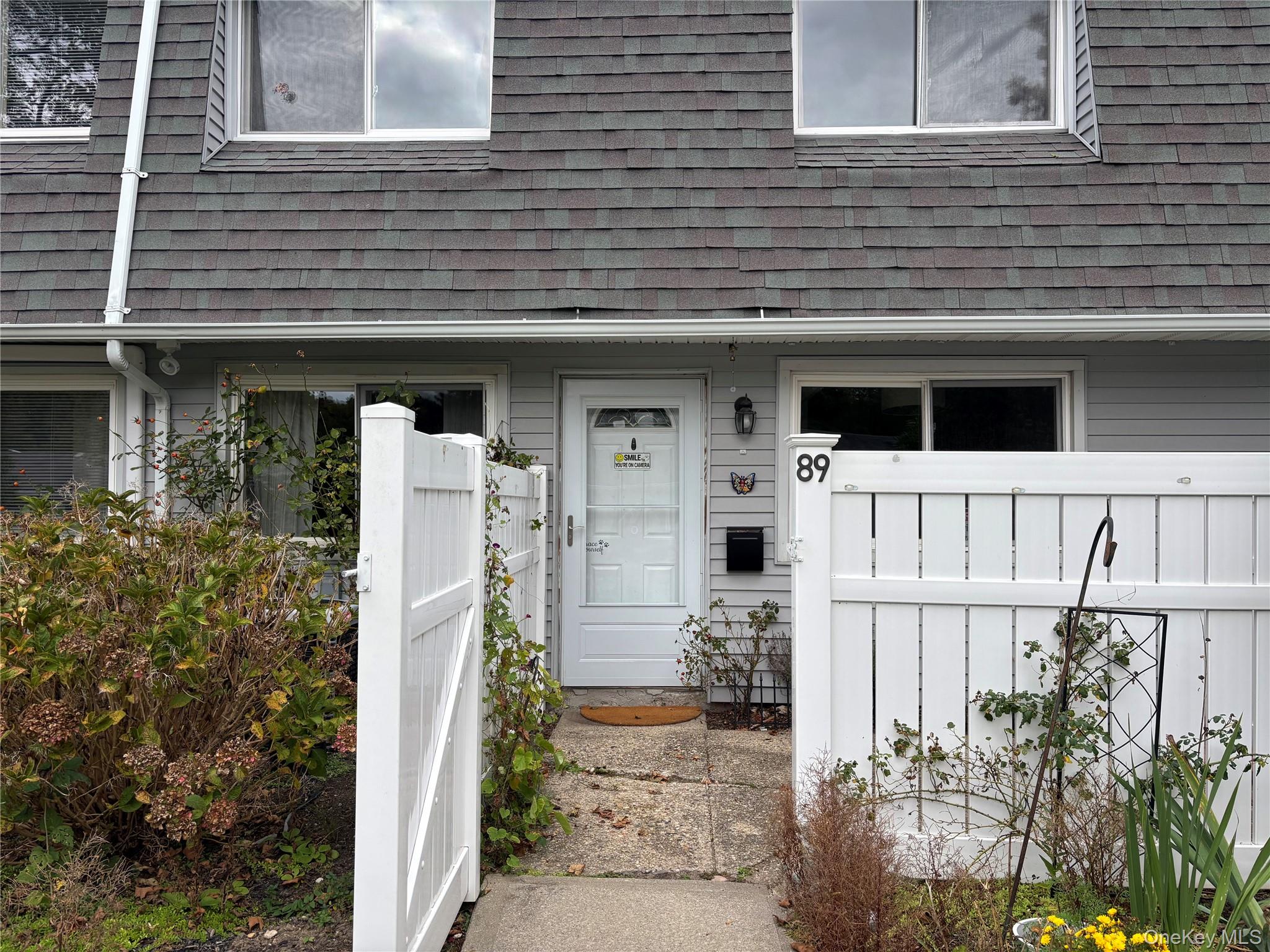 Doorway to property featuring a gate