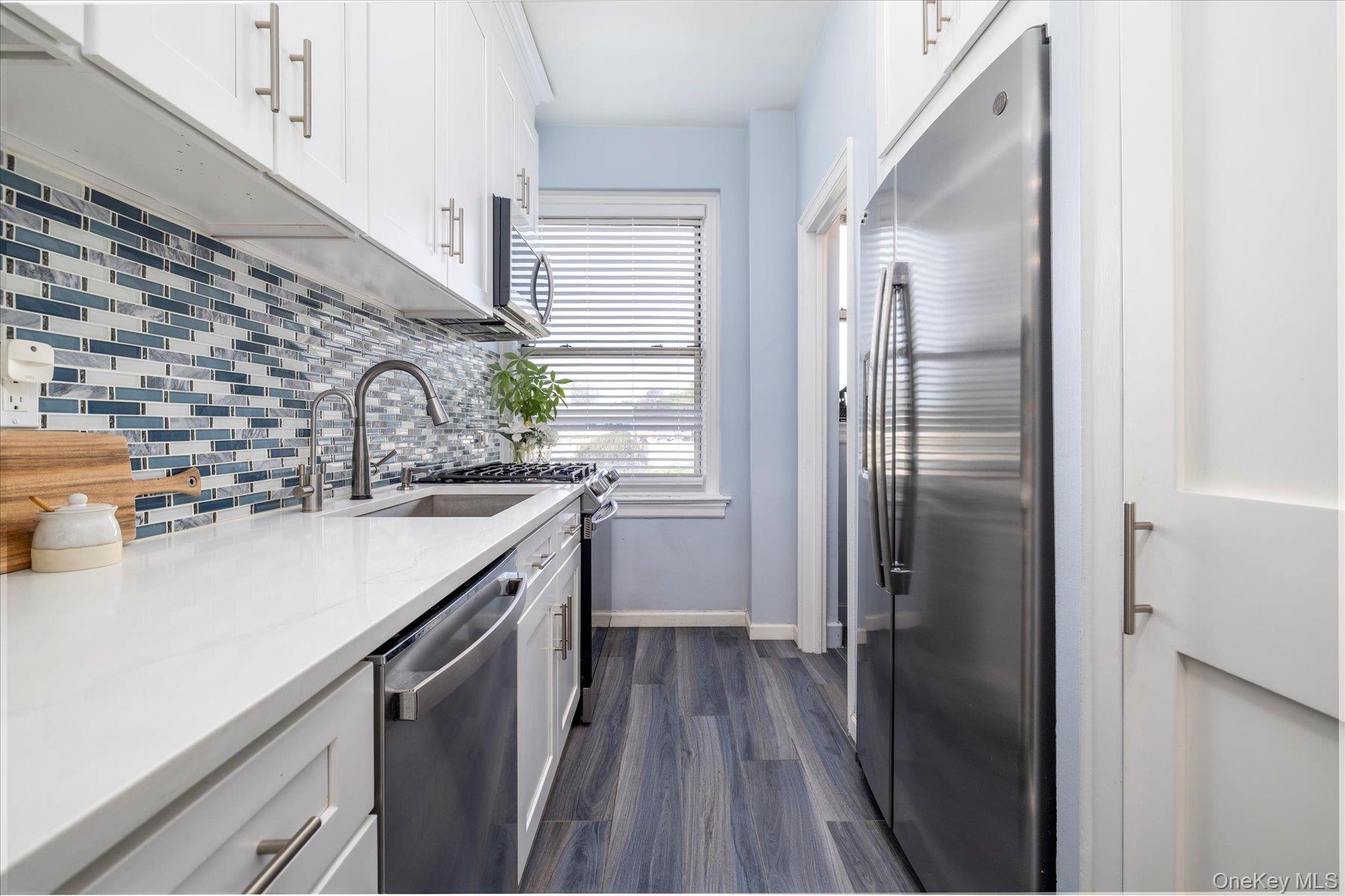 Come tour this pre-war gem, an unbeatable location, price, and move-in ready!