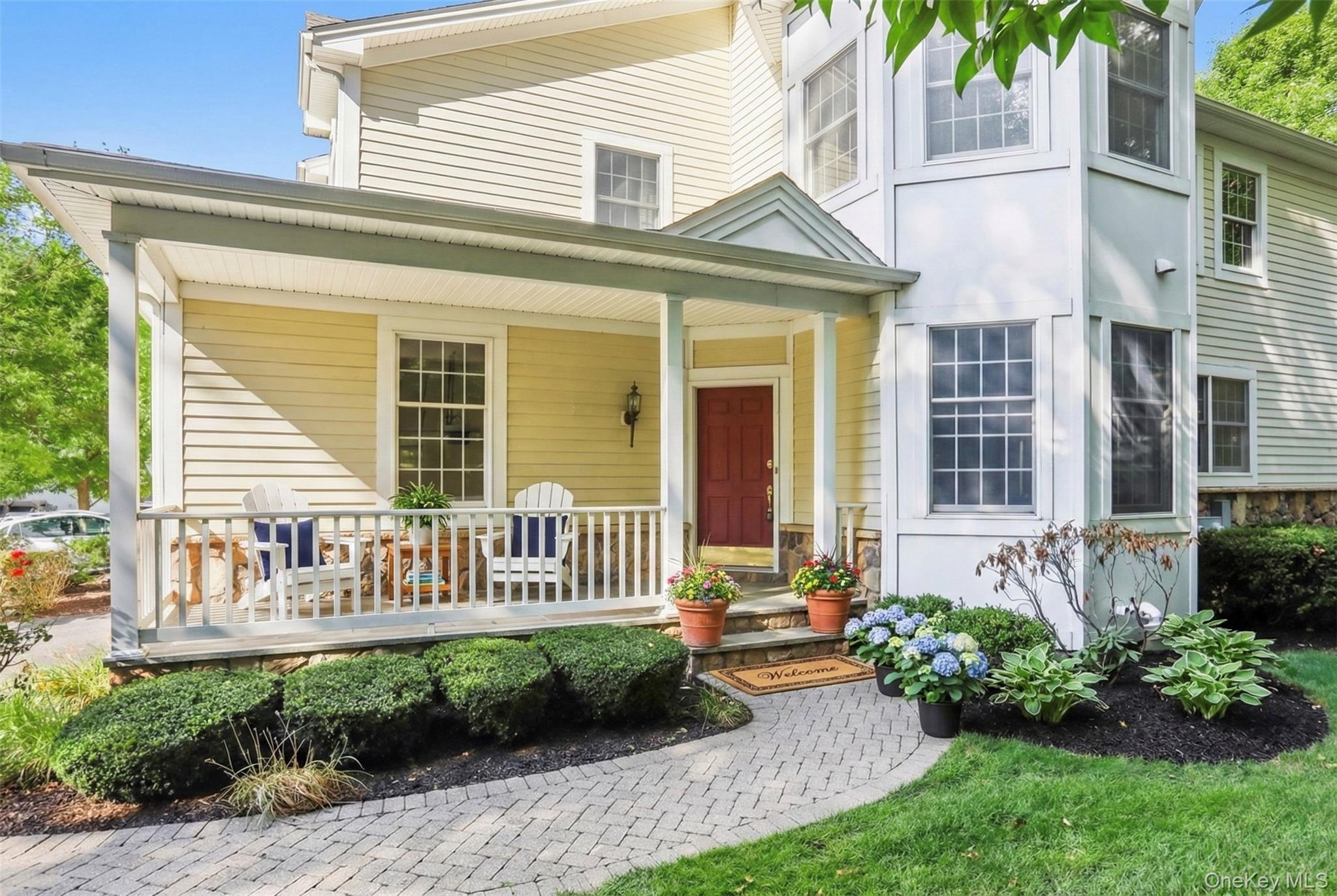 Property entrance with a porch