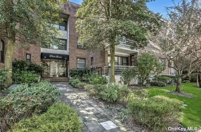 View of front of property with brick siding
