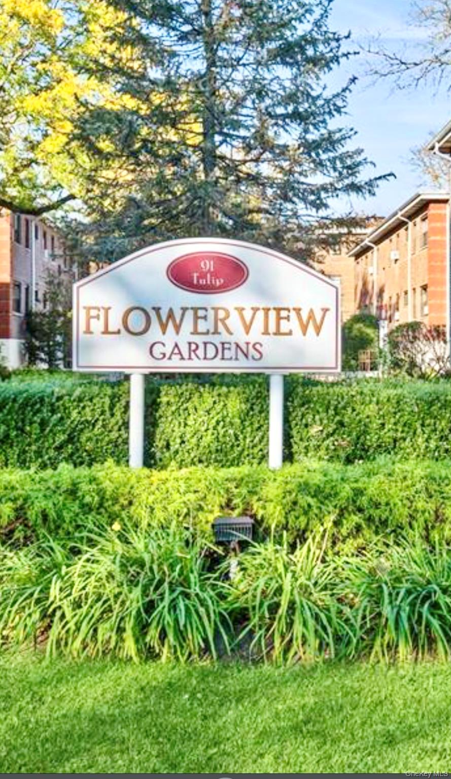 View of community sign 91 Tulip Ave Juniper C2 Floral Park NY 11001