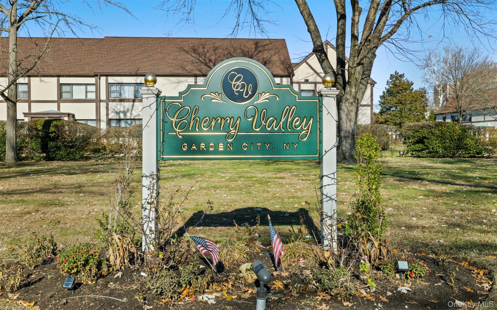 Community sign with a lawn