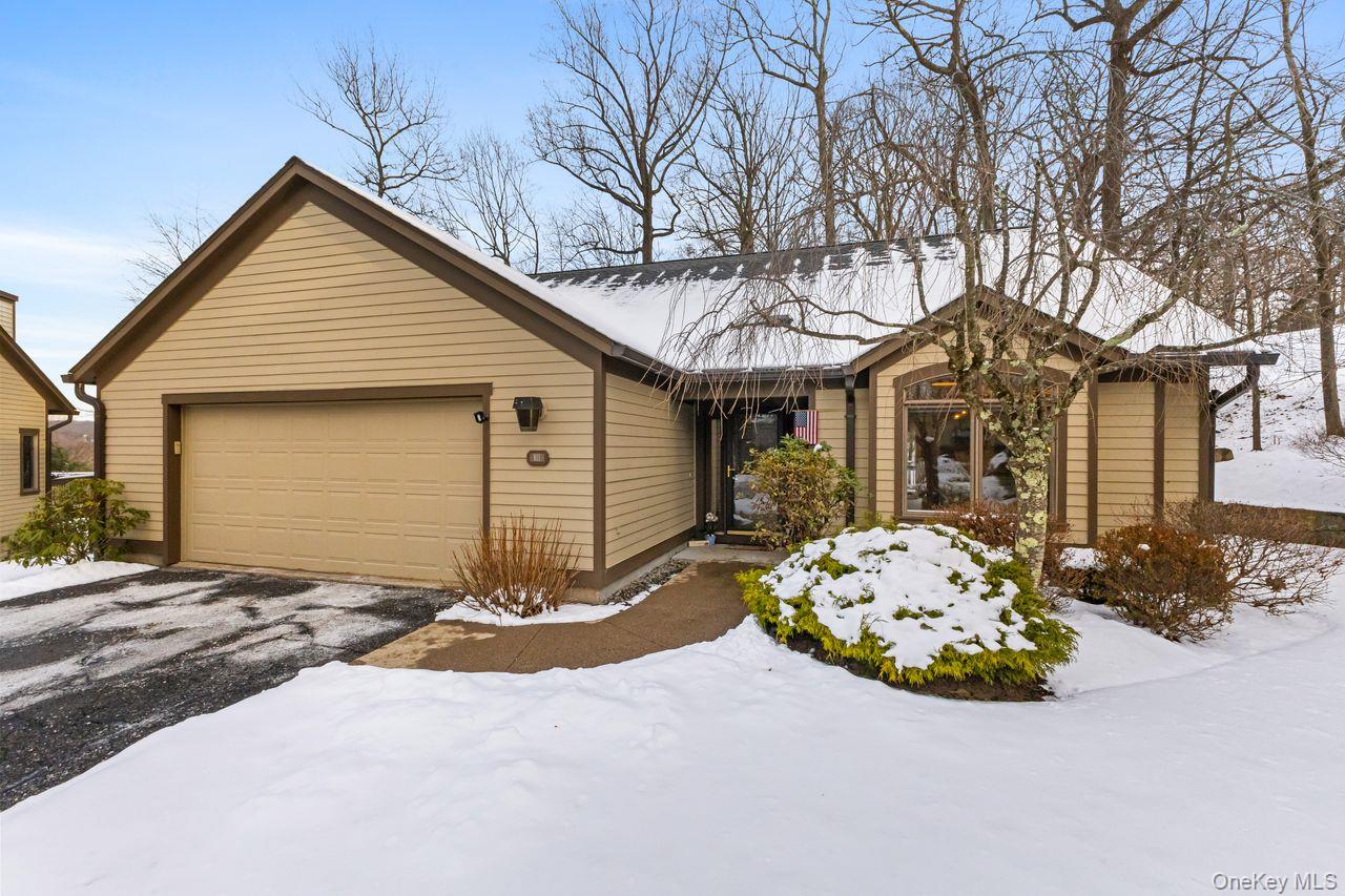 One level free standing Harvard model with 2 car garage and gas heat!