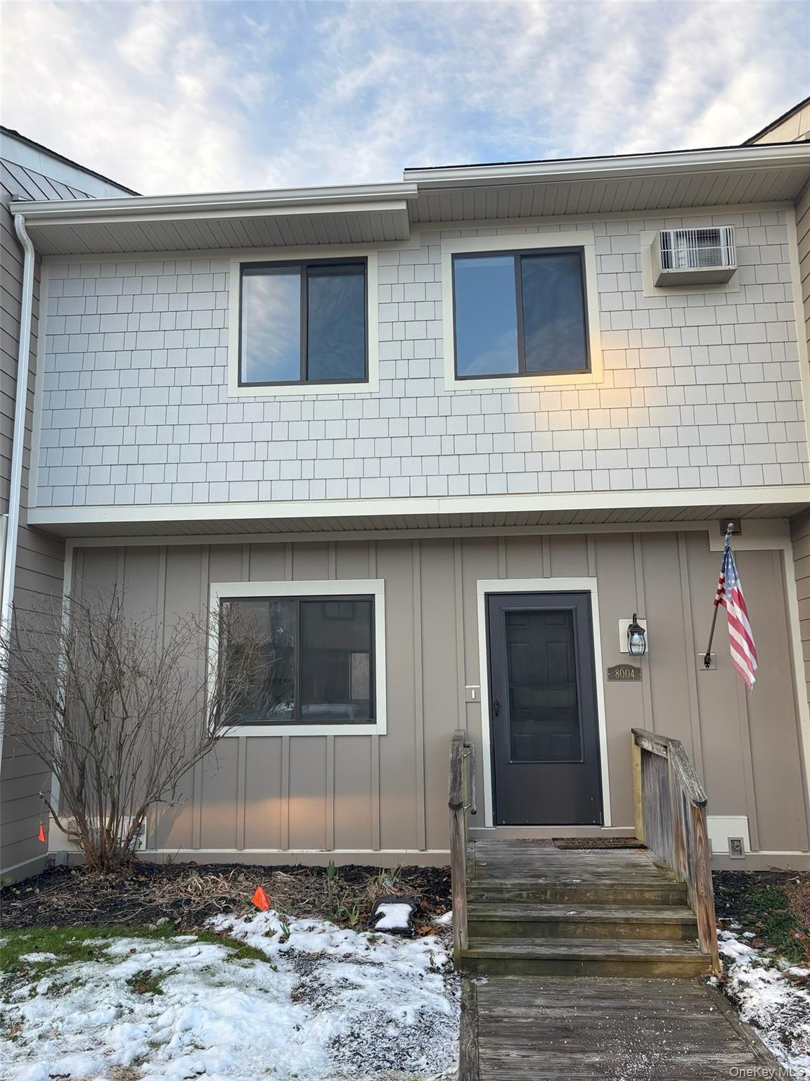 View of front of property featuring board and batten siding