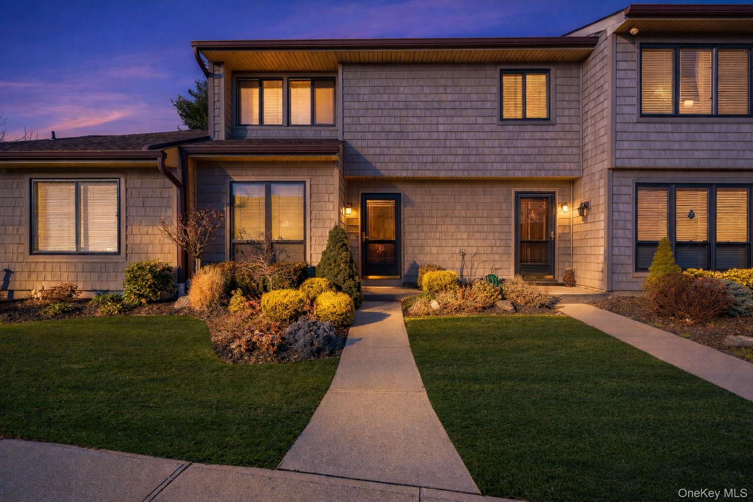 View of front of home with a front yard