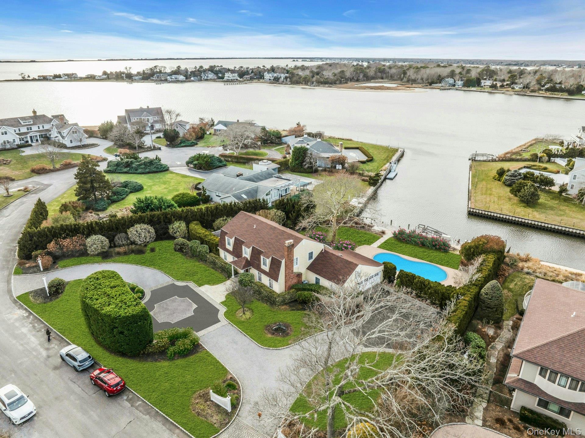 Aerial view of residential area with a large body of water
