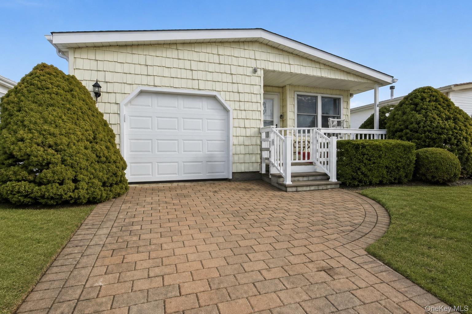 This Unit Offers 2 Bedrooms and 2 full Bathrooms With An Attached Garage