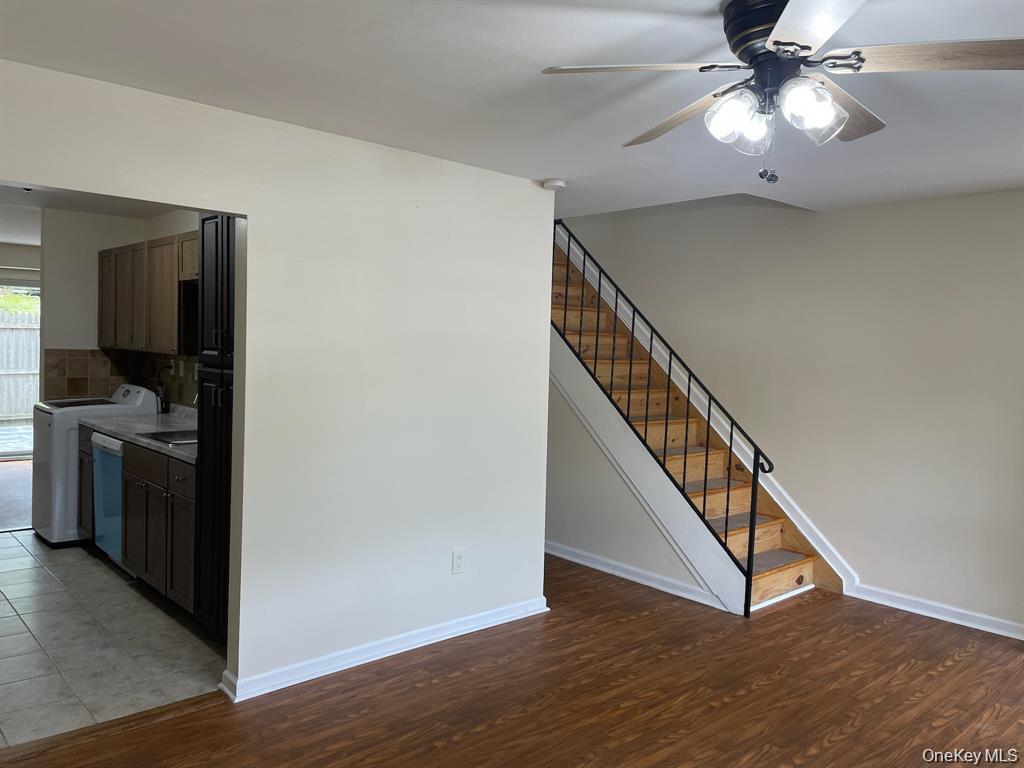 Front Entry to Living Room with Staircase to Second Floor