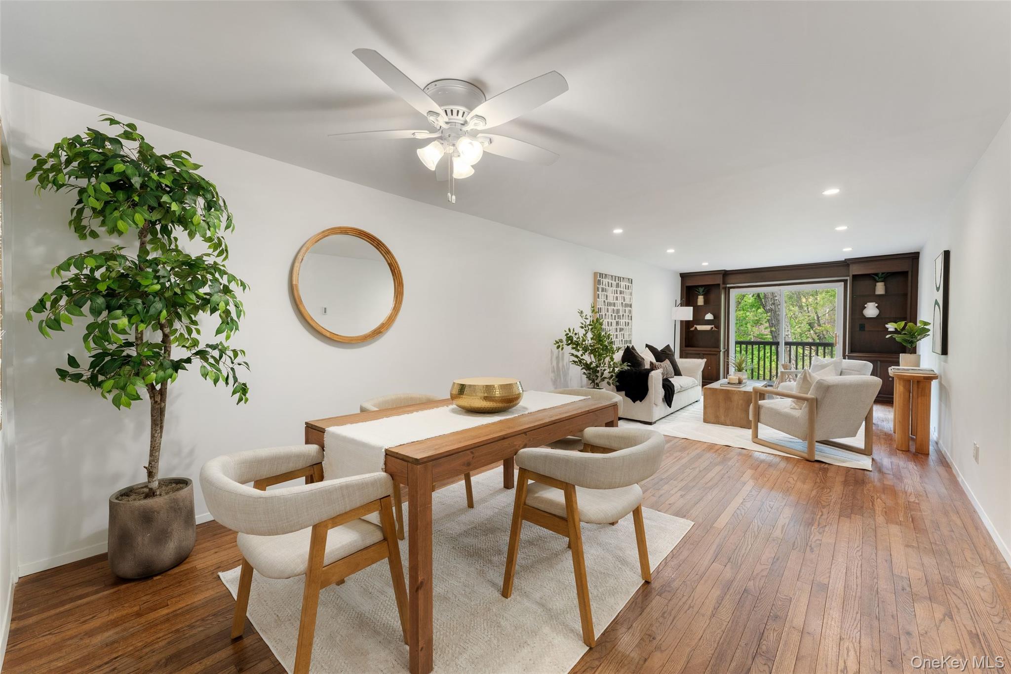 Oversized and flexible living space currently being used as a dining area and living room