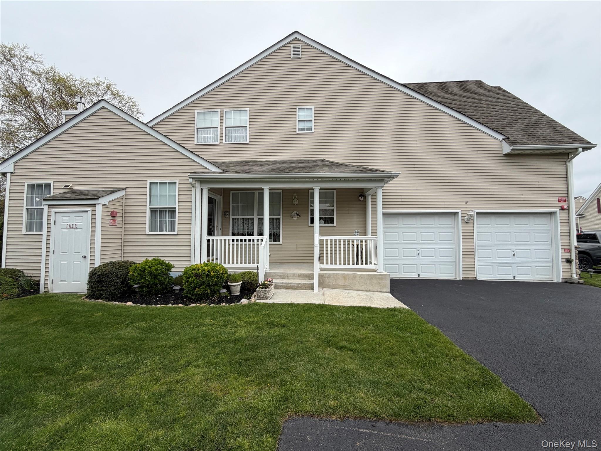 Welcome to 19 Meadow Pond Ct., a covered front porch, 2 car garage, 3 extra spaces to park, plus 3 guest spaces on the street!