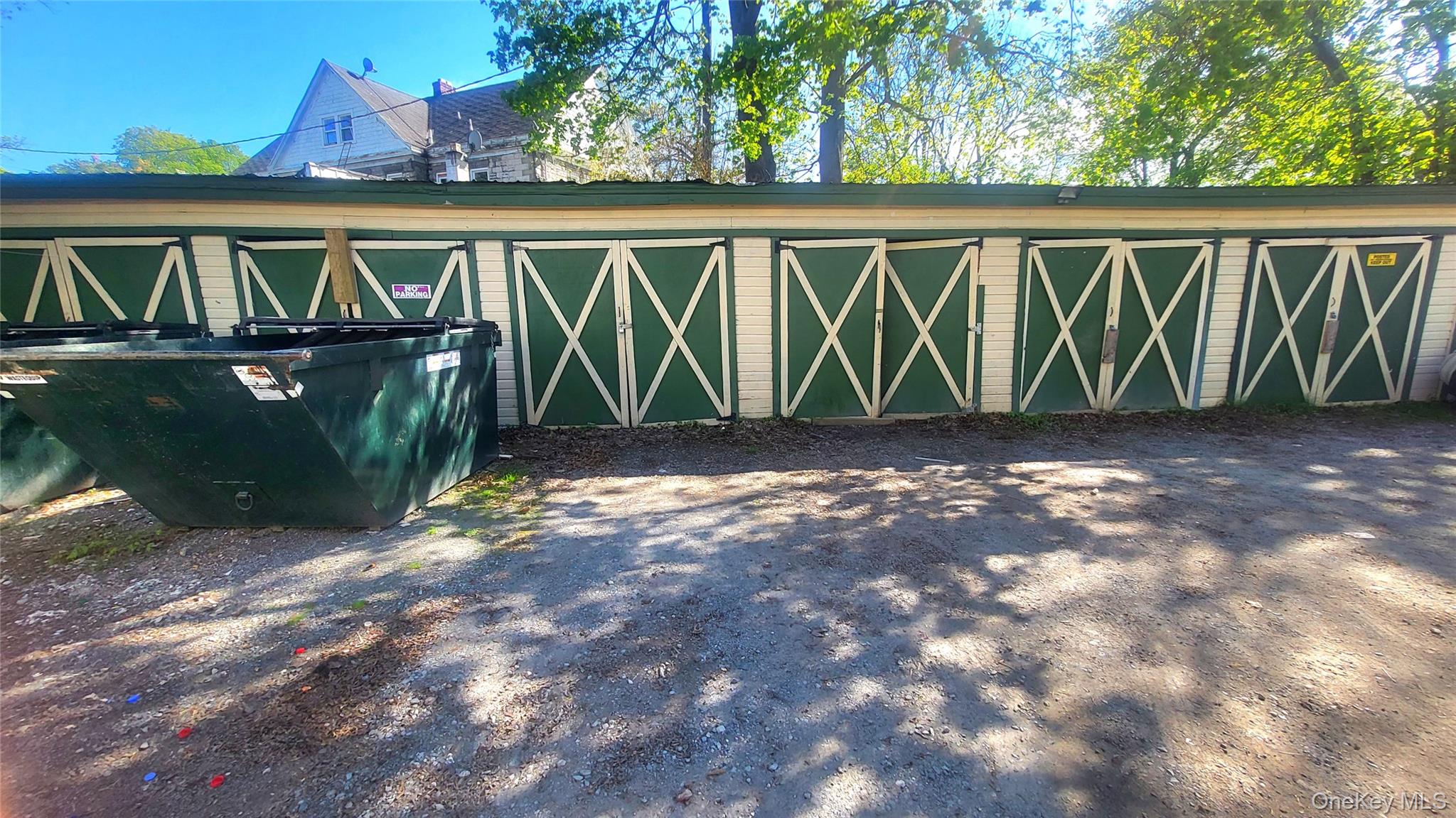 Property Includes (8) Garages