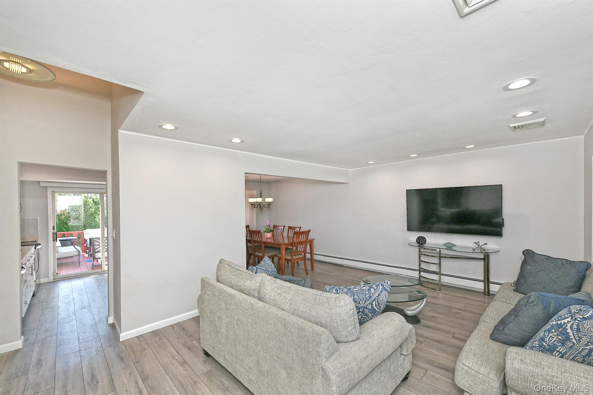 Open Floor Plan With Hi Hat Lighting