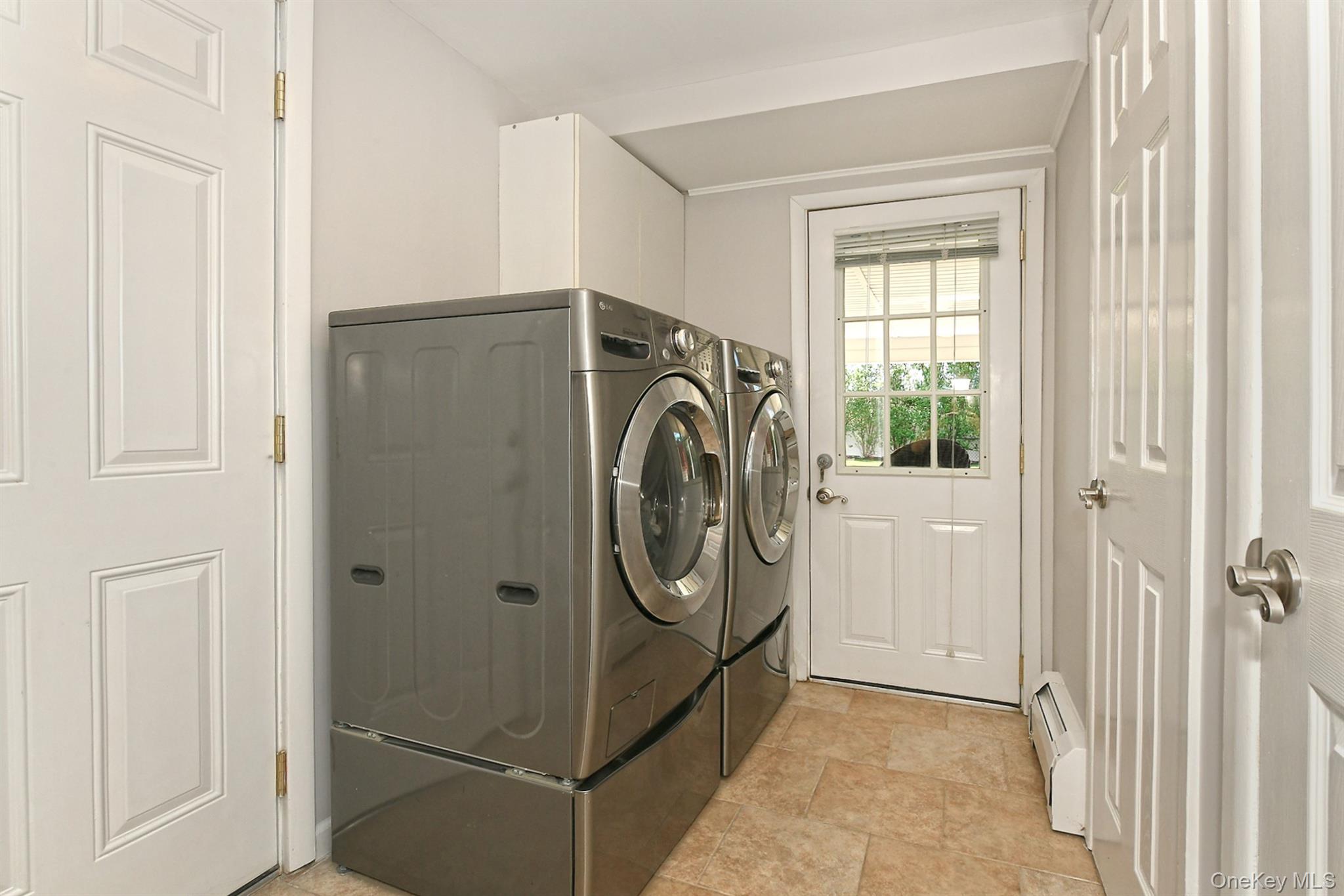 Front Load Washer & Dryer With Entry To Covered Patio