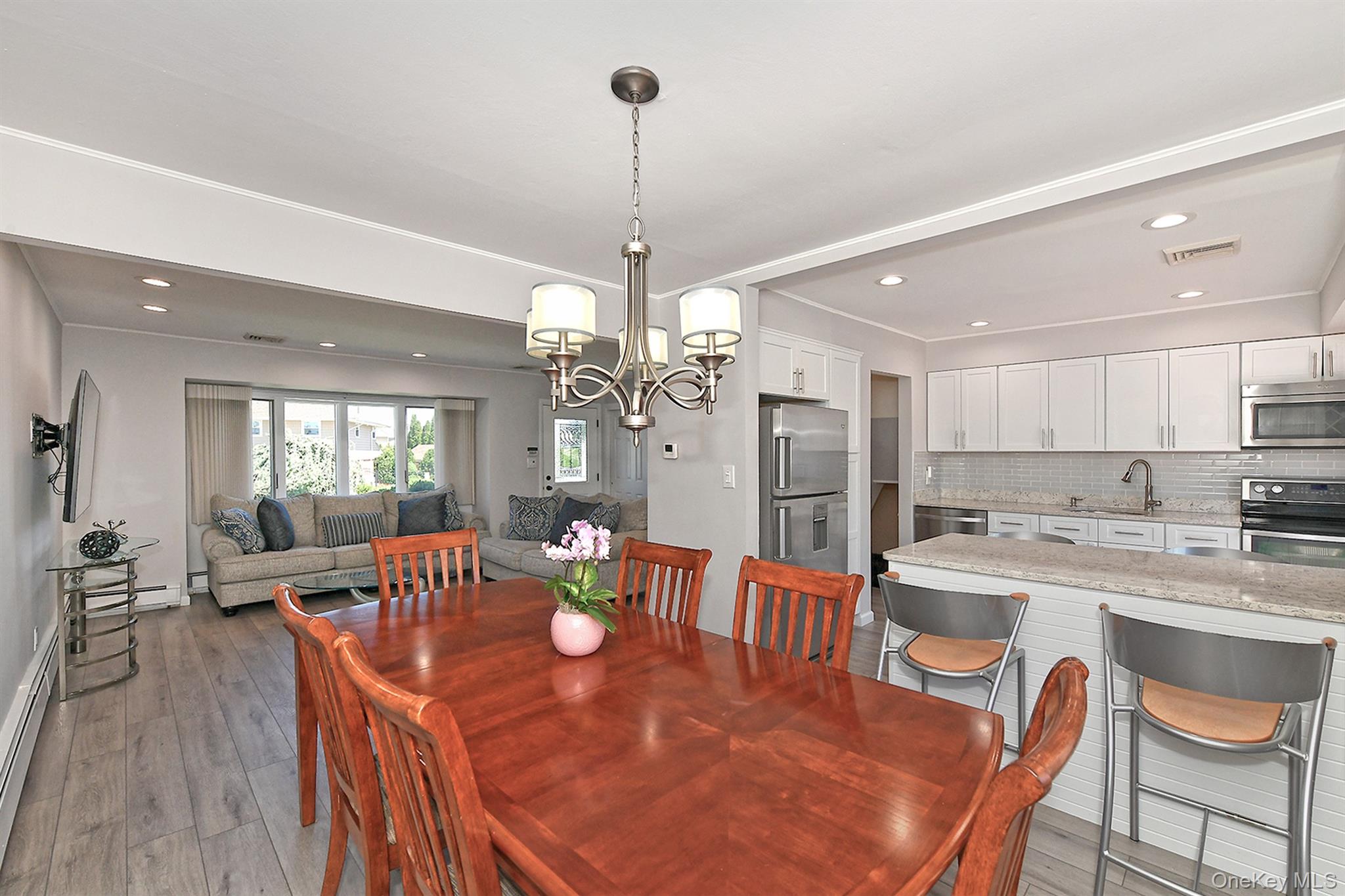 Chandelier & Custom Blinds Are Included