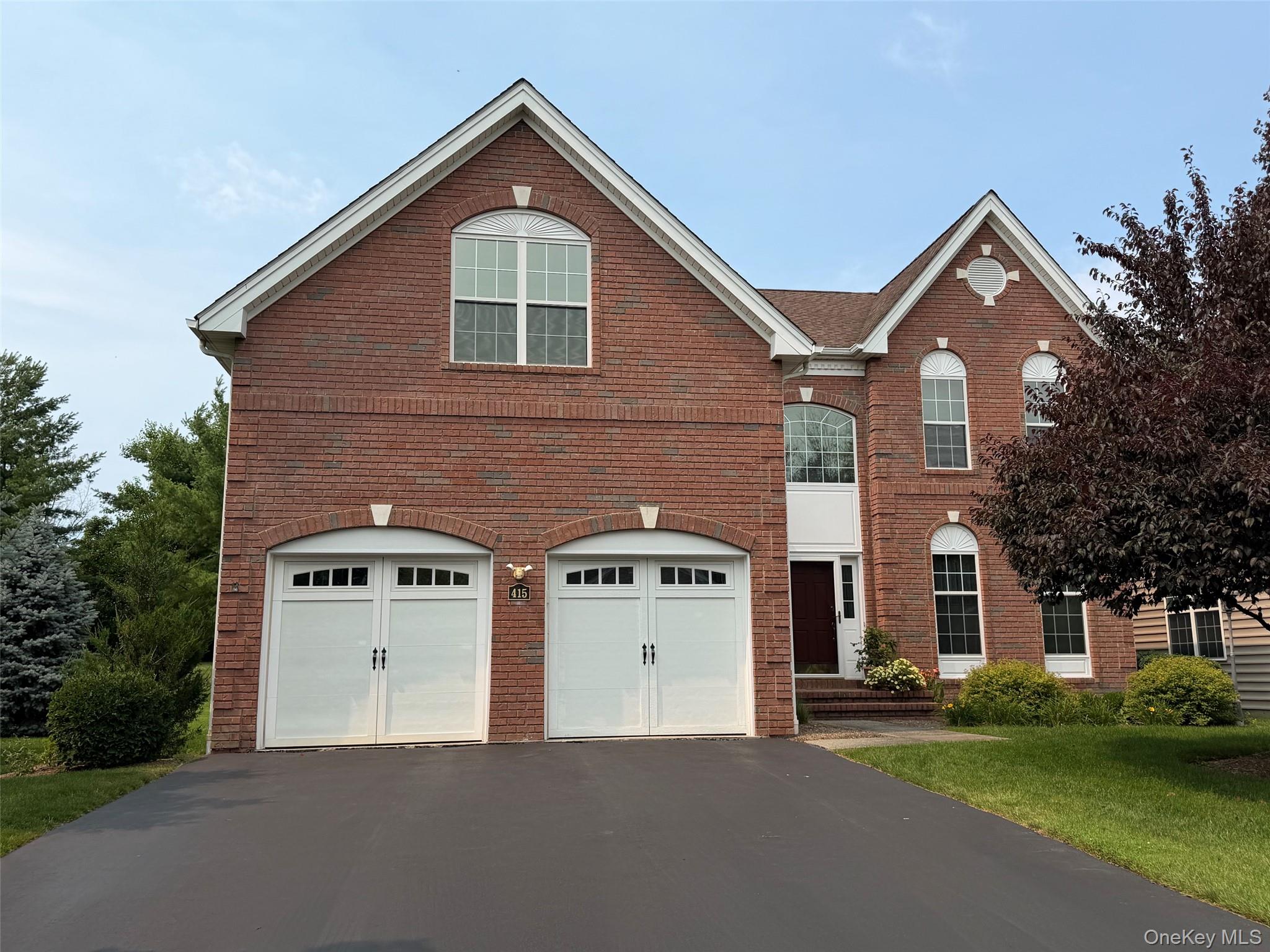 Stately Colonial 4 Bedroom, 4 Full Bath, 2 car garage