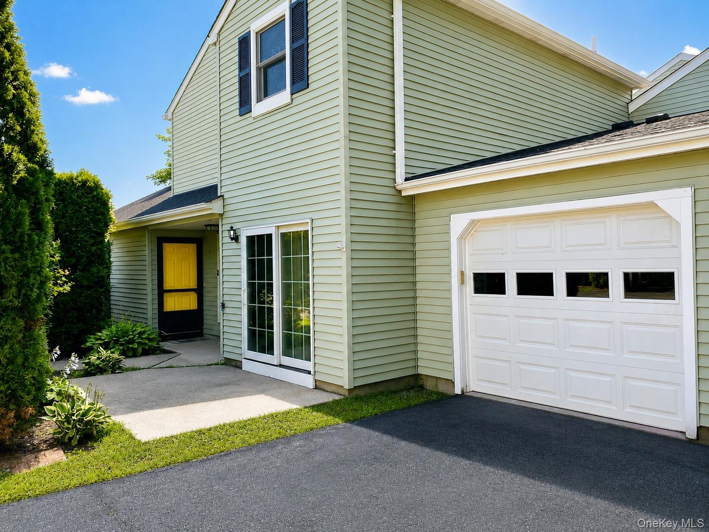 One car garage and patio.