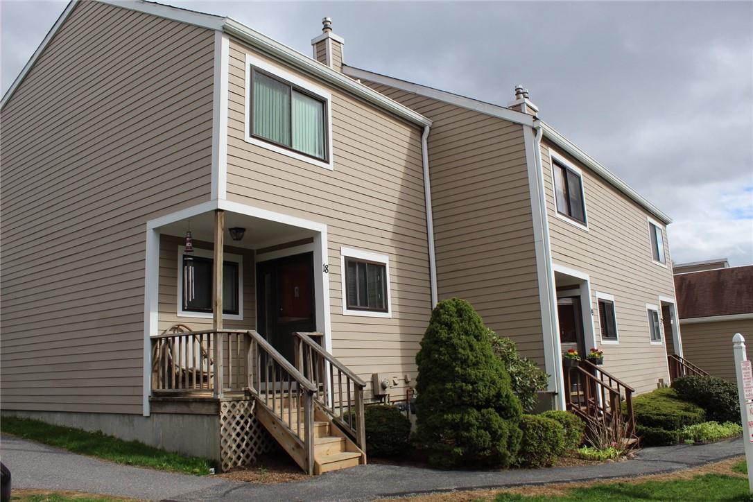 Townhouse style condo with three floors of living area.  Deck in the front and patio in the back.