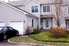 Pristine Townhome Awaits Your Arrival