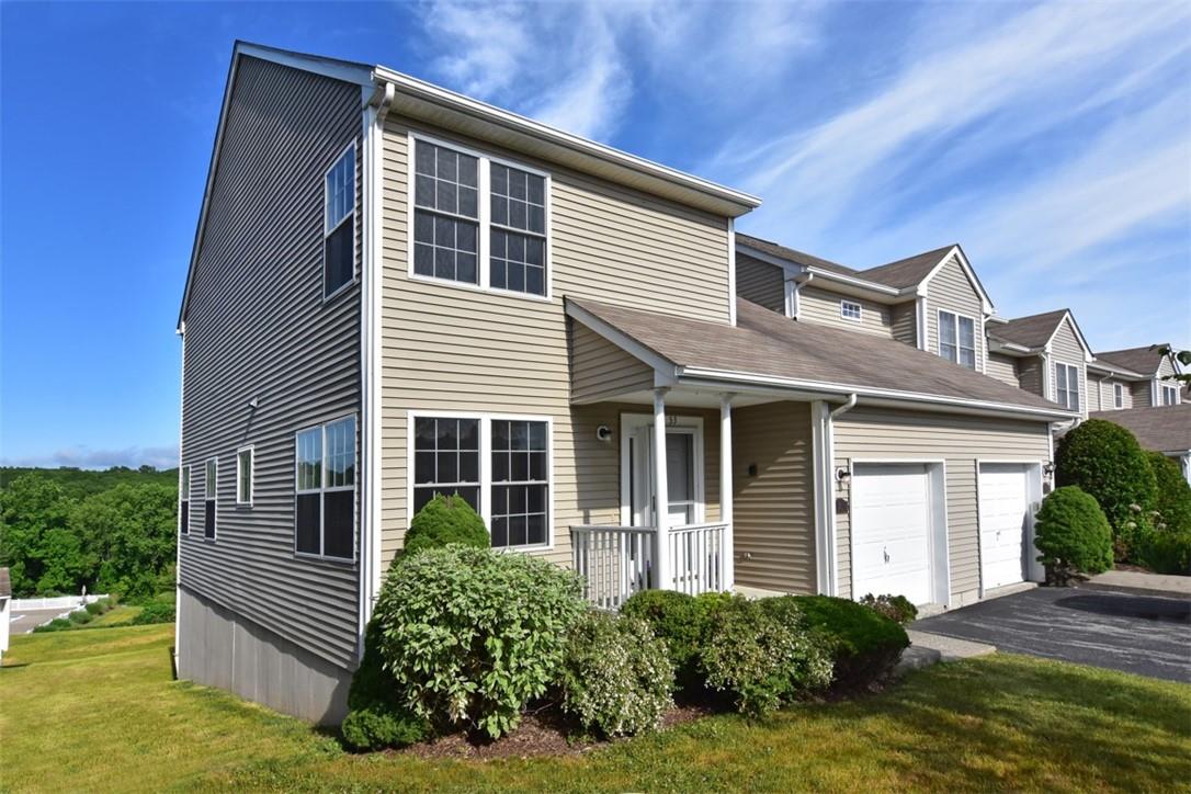 53 Sparrow Ridge Road-enjoy care-free townhouse living in a peaceful setting. Bright & cheerful - instantly appealing end unit.