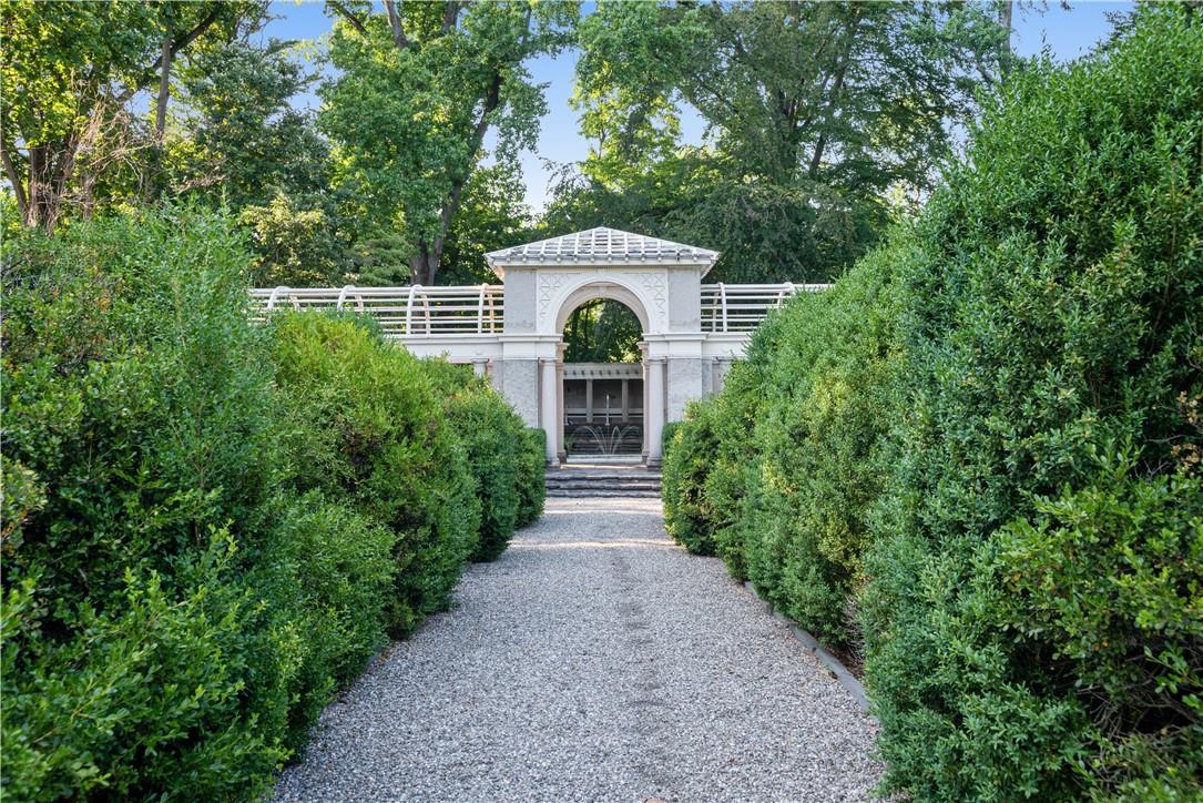 Set on 33 acres of lovely gardens and Italianate-inspired architecture, 25 Beechwood Way is your oasis for leisurely walks, picnic, reading, (or nap) on the lush lawn.