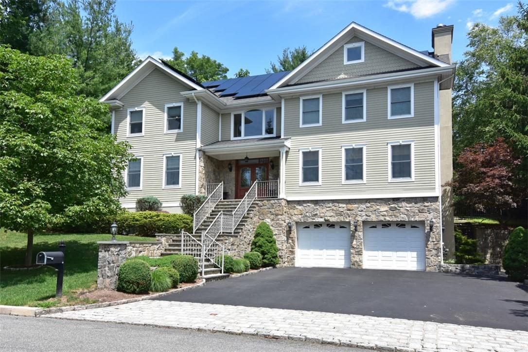 Stunning, custom home is in excellent condition!  Beautiful stone accents the clean design of the home.  Irvington schools, express train to NYC plus pool, tennis, clubhouse and playgrounds create the perfect lifestyle!  Top of the line solar panels by Su