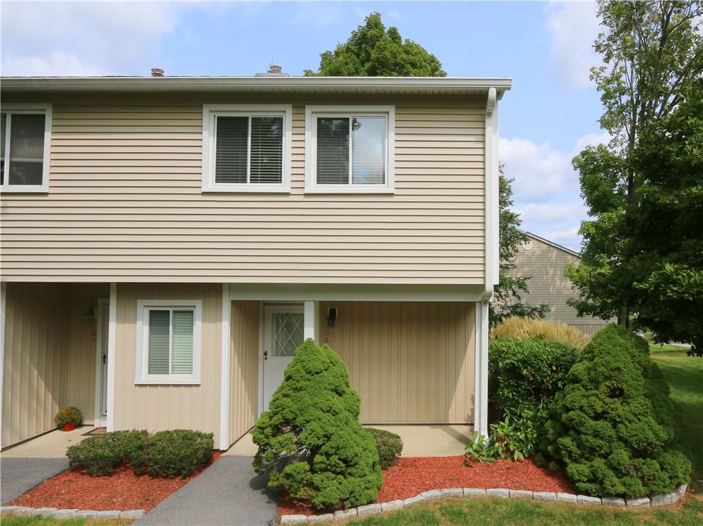 High Meadow Condo End Unit with such nice green space and patio at your front door.